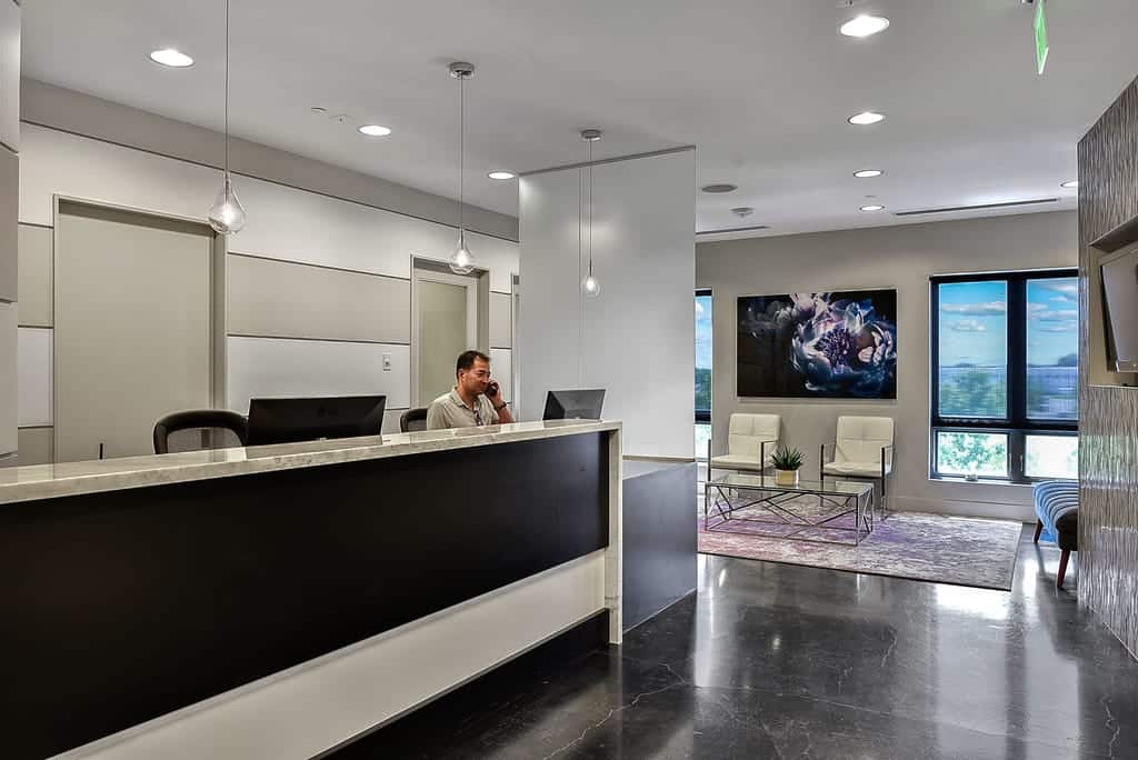 longmont dental loft front desk with person answering phones