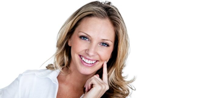 woman with bright smile due to teeth whitening tips