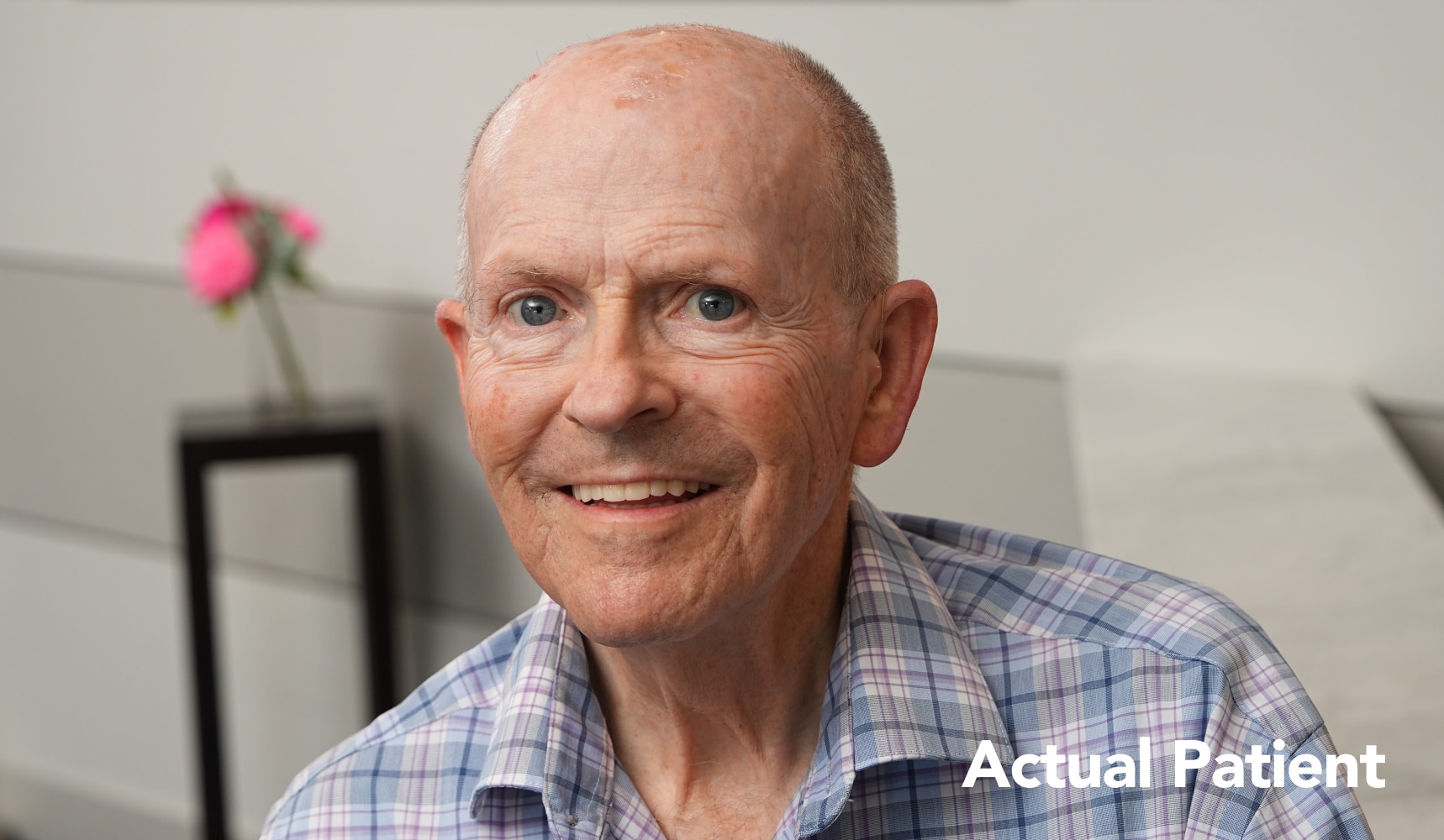 Dennis smiling in an after headshot following his All-on-X dental implant treatment at Longmont Dental Loft.
