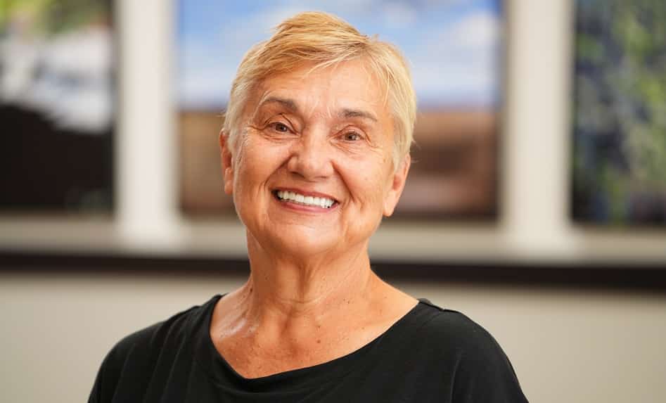 Marianne smiling after dental implant treatment at Longmont Dental Loft